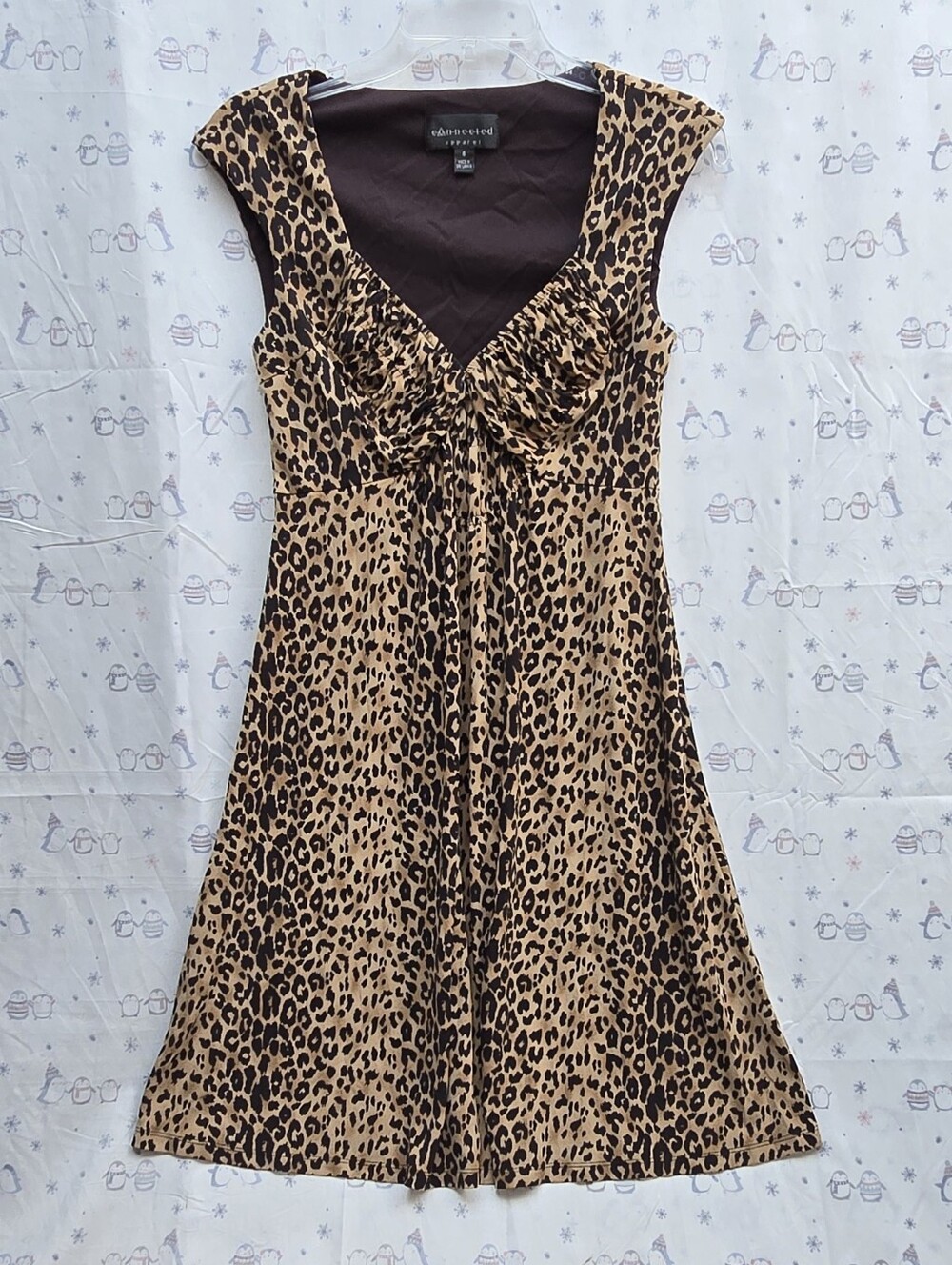 Connected Apparel Brown Leopard Sleeveless Ruched V-neckline Mini Dress. Size 6